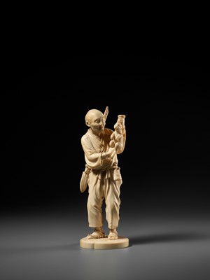 Lot 138 - KOSEI: A FINE TOKYO SCHOOL IVORY OKIMONO OF A HUNTER HOLDING A HARE