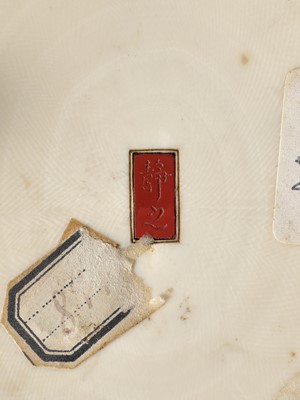 Lot 283 - SEISHI: A FINE AND RARE IVORY OKIMONO OF A WOODBLOCK PRINT MAKER WITH HIS SON