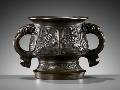 Lot 324 - AN ARCHAISTIC BRONZE GUI-FORM CENSER, 17TH-18TH CENTURY