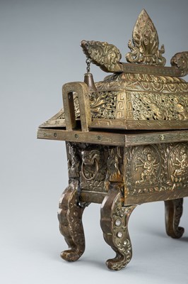 A GILT COPPER REPOUSSÉ CENSER AND RETICULATED COVER, FANGDING, QING DYNASTY