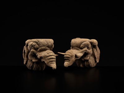 Lot 323 - A RARE PAIR OF CARVED WOOD ‘BAKU’ ARCHITECTURAL ELEMENTS