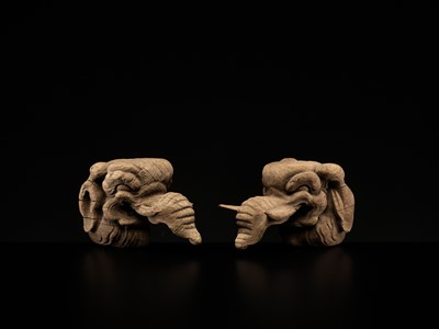 Lot 323 - A RARE PAIR OF CARVED WOOD ‘BAKU’ ARCHITECTURAL ELEMENTS