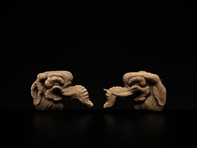 Lot 323 - A RARE PAIR OF CARVED WOOD ‘BAKU’ ARCHITECTURAL ELEMENTS