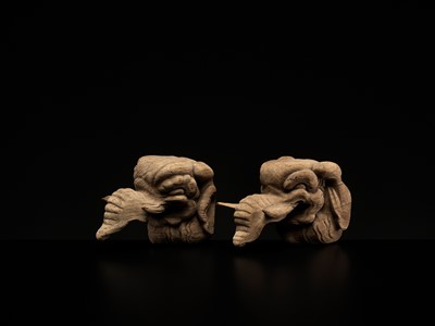 Lot 323 - A RARE PAIR OF CARVED WOOD ‘BAKU’ ARCHITECTURAL ELEMENTS
