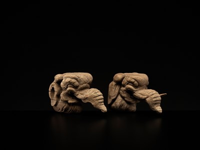 Lot 323 - A RARE PAIR OF CARVED WOOD ‘BAKU’ ARCHITECTURAL ELEMENTS