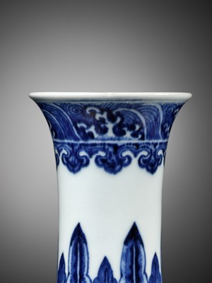 Lot 277 - A BLUE AND WHITE ‘MING-STYLE’ BOTTLE VASE, QIANLONG MARK AND PERIOD