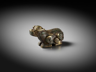 Lot 163 - A GILT BRONZE LION-FORM WEIGHT, LATE MING DYNASTY