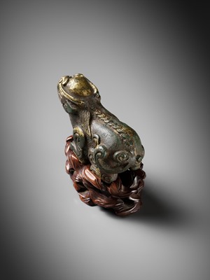 Lot 163 - A GILT BRONZE LION-FORM WEIGHT, LATE MING DYNASTY