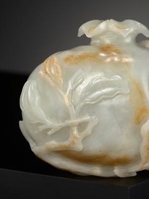 Lot 95 - A PALE CELADON AND RUSSET JADE ‘CICADA AND POMEGRANATE’ WATER POT, CHINA, 18TH CENTURY