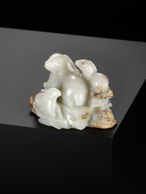 Lot 29 - A WHITE AND RUSSET JADE ‘SANYANG AND LINGZHI’ GROUP, QING DYNASTY