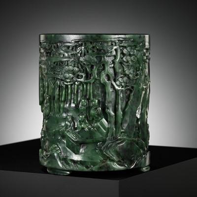 Lot 38 - A SPINACH-GREEN JADE ‘SEVEN SAGES OF THE BAMBOO GROVE’ (ZHULIN QIXIAN) BRUSHPOT, BITONG, QIANLONG PERIOD