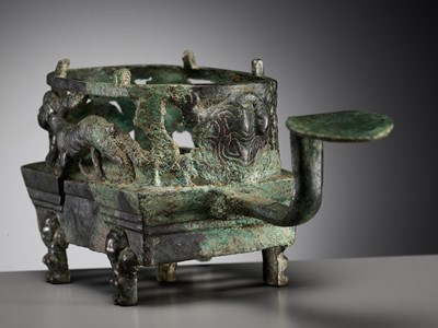 Lot 102 - A ‘FOUR AUSPICIOUS BEASTS’ (SI XIANG) BRONZE BRAZIER, HAN DYNASTY, CHINA, 206 BC-220 AD