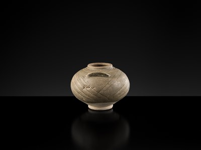 Lot 137 - A YUE WARE ‘BIRD’ WATERPOT, SIX DYNASTIES