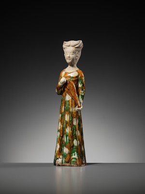 Lot 62 - A SANCAI GLAZED POTTERY FIGURE OF A FEMALE MUSICIAN PLAYING THE PIPA, TANG DYNASTY