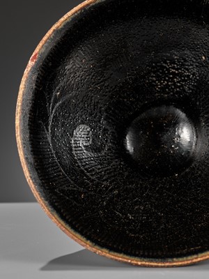 Lot 144 - A CIZHOU SILVER-DECORATED AND BLACK-GLAZED TEA BOWL, SOUTHERN SONG OR JIN DYNASTY