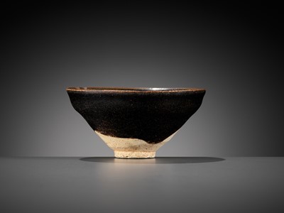 Lot 144 - A CIZHOU SILVER-DECORATED AND BLACK-GLAZED TEA BOWL, SOUTHERN SONG OR JIN DYNASTY