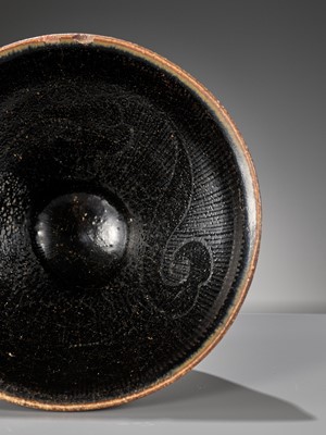 Lot 144 - A CIZHOU SILVER-DECORATED AND BLACK-GLAZED TEA BOWL, SOUTHERN SONG OR JIN DYNASTY