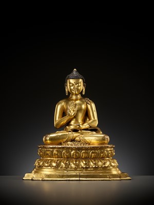Lot 179 - A GILT COPPER ALLOY FIGURE OF AMOGHASIDDHI, ONE OF THE FIVE WISDOM BUDDHAS, POSSIBLY DENSATIL, TIBET, 14TH-15TH CENTURY