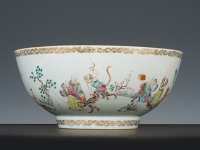 Lot 282 - A GILT FAMILLE-ROSE ‘EIGHTEEN LUOHAN’ PUNCH BOWL, QIANLONG PERIOD