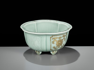 Lot 114 - A MOLDED, LOBED AND GILT CELADON-GLAZED JARDINIÈRE, QIANLONG MARK AND PERIOD