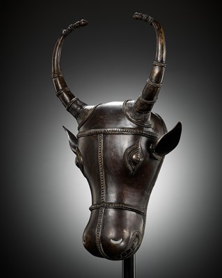 Lot 302 - A BRONZE BHUTA CULT MASK OF NANDI, SOUTH INDIA, LATE 18TH TO EARLY 19TH CENTURY