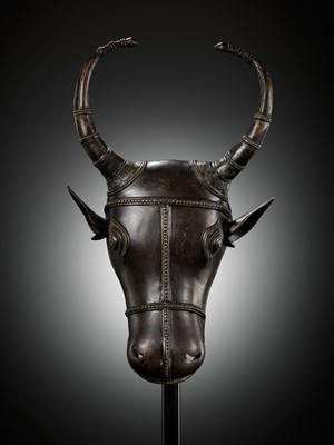 Lot 302 - A BRONZE BHUTA CULT MASK OF NANDI, SOUTH INDIA, LATE 18TH TO EARLY 19TH CENTURY