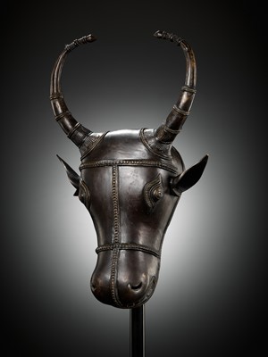 Lot 302 - A BRONZE BHUTA CULT MASK OF NANDI, SOUTH INDIA, LATE 18TH TO EARLY 19TH CENTURY