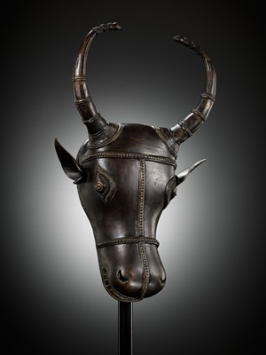 Lot 302 - A BRONZE BHUTA CULT MASK OF NANDI, SOUTH INDIA, LATE 18TH TO EARLY 19TH CENTURY