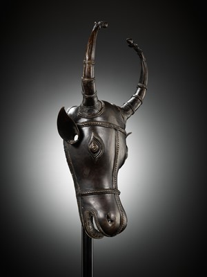 Lot 302 - A BRONZE BHUTA CULT MASK OF NANDI, SOUTH INDIA, LATE 18TH TO EARLY 19TH CENTURY