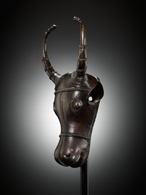 Lot 302 - A BRONZE BHUTA CULT MASK OF NANDI, SOUTH INDIA, LATE 18TH TO EARLY 19TH CENTURY