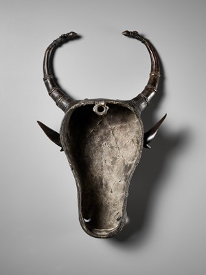 Lot 302 - A BRONZE BHUTA CULT MASK OF NANDI, SOUTH INDIA, LATE 18TH TO EARLY 19TH CENTURY