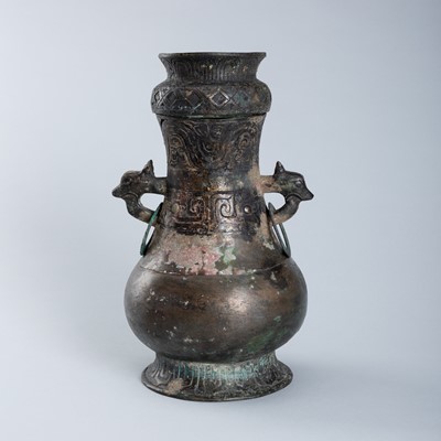 Lot 1560 - A BRONZE WINE CONTAINER, HU, WESTERN ZHOU DYNASTY