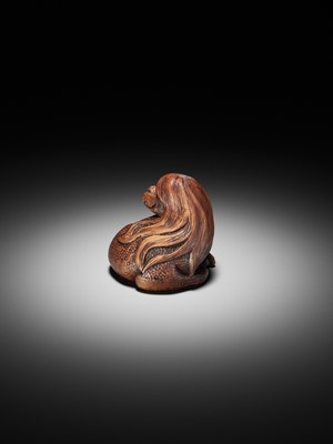 Lot 194 - SUKEYUKI: A SUPERB WOOD NETSUKE OF A LONG-HAIRED KAPPA