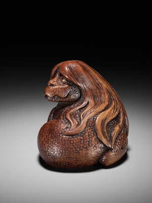 Lot 194 - SUKEYUKI: A SUPERB WOOD NETSUKE OF A LONG-HAIRED KAPPA