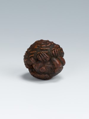 A WOOD NETSUKE OF KONOHA TENGU HIDING