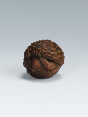 A WOOD NETSUKE OF KONOHA TENGU HIDING