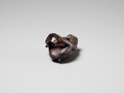 Lot 259 - HARUMITSU: AN AMUSING WOOD OKIMONO DEPICTING TWO MONKEYS