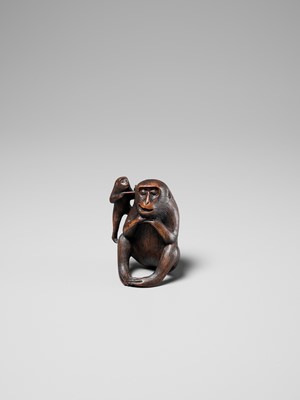 Lot 259 - HARUMITSU: AN AMUSING WOOD OKIMONO DEPICTING TWO MONKEYS