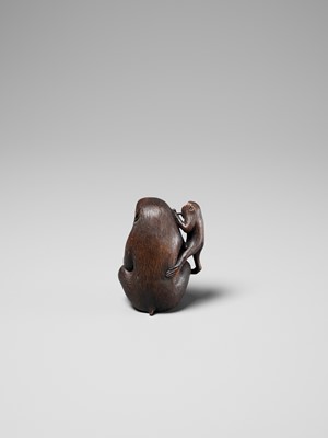 Lot 259 - HARUMITSU: AN AMUSING WOOD OKIMONO DEPICTING TWO MONKEYS