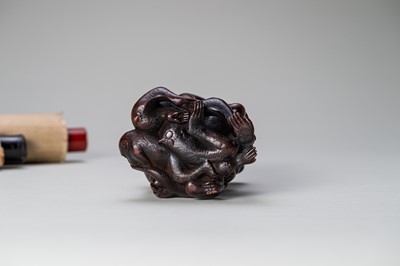 Lot 260 - A FINE WOOD OKIMONO DEPICTING A PILE OF MONKEYS
