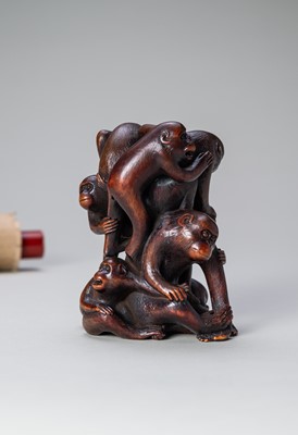 Lot 260 - A FINE WOOD OKIMONO DEPICTING A PILE OF MONKEYS