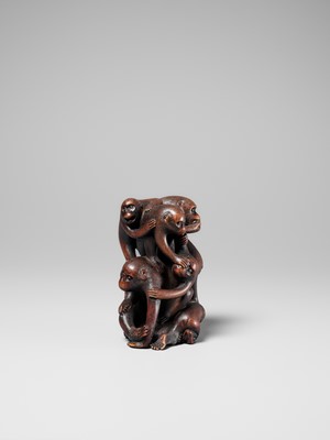 Lot 260 - A FINE WOOD OKIMONO DEPICTING A PILE OF MONKEYS