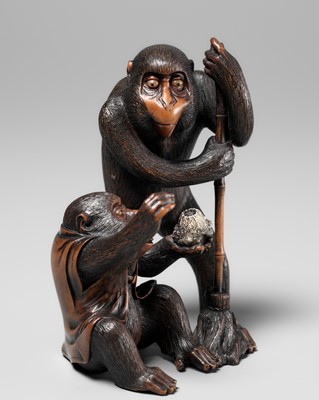 Lot 257 - AN AMUSING WOOD OKIMONO OF TWO MONKEYS WITH A WASP’S NEST, ATTRIBUTED TO HOKYUDO ITSUMIN