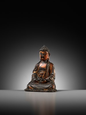 Lot 72 - A GILT-LACQUERED BRONZE FIGURE OF BUDDHA, MING DYNASTY