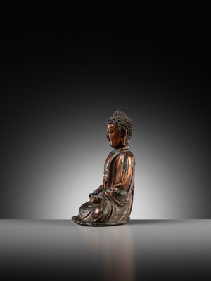 Lot 72 - A GILT-LACQUERED BRONZE FIGURE OF BUDDHA, MING DYNASTY