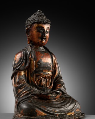 Lot 329 - A GILT-LACQUERED BRONZE FIGURE OF BUDDHA, MING DYNASTY