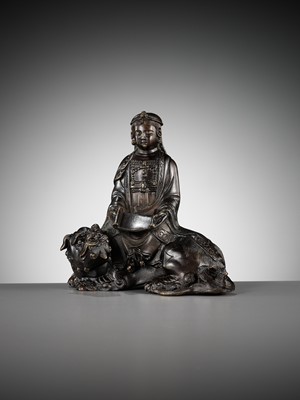Lot 661 - A BRONZE FIGURE OF WENSHU (MANJUSHRI) ON A LION, LATE MING TO EARLY QING DYNASTY