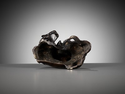 Lot 661 - A BRONZE FIGURE OF WENSHU (MANJUSHRI) ON A LION, LATE MING TO EARLY QING DYNASTY