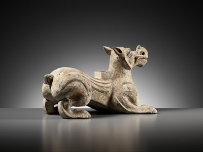 Lot 62 - A PAINTED POTTERY ‘MYTHICAL BEAST’ STAND, EASTERN HAN DYNASTY
