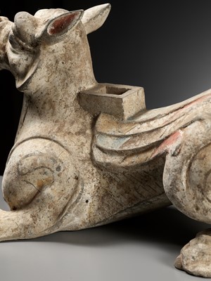 Lot 62 - A PAINTED POTTERY ‘MYTHICAL BEAST’ STAND, EASTERN HAN DYNASTY